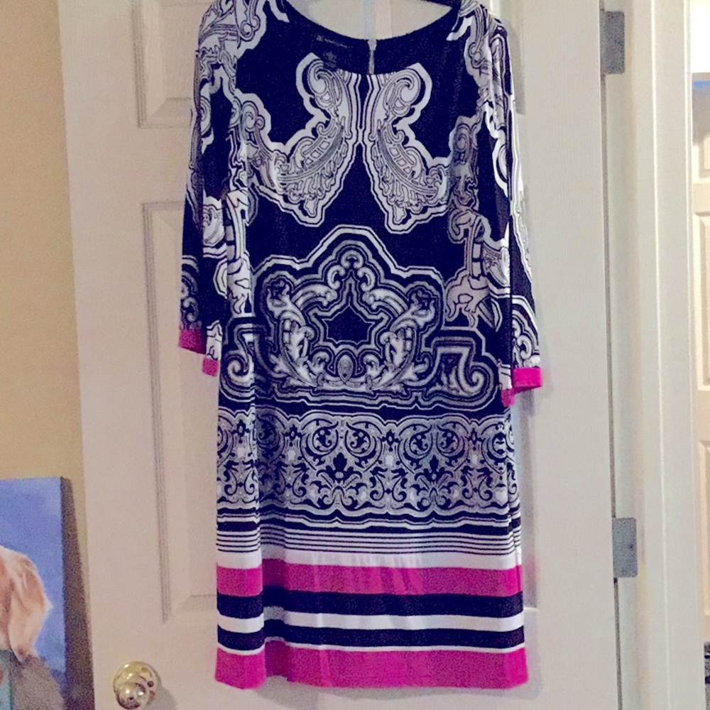 This B & W dress with a pop of pink can be yours!
